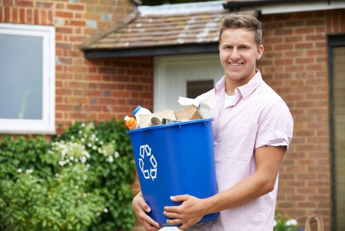 Operative placing a skip with attention to access and safety